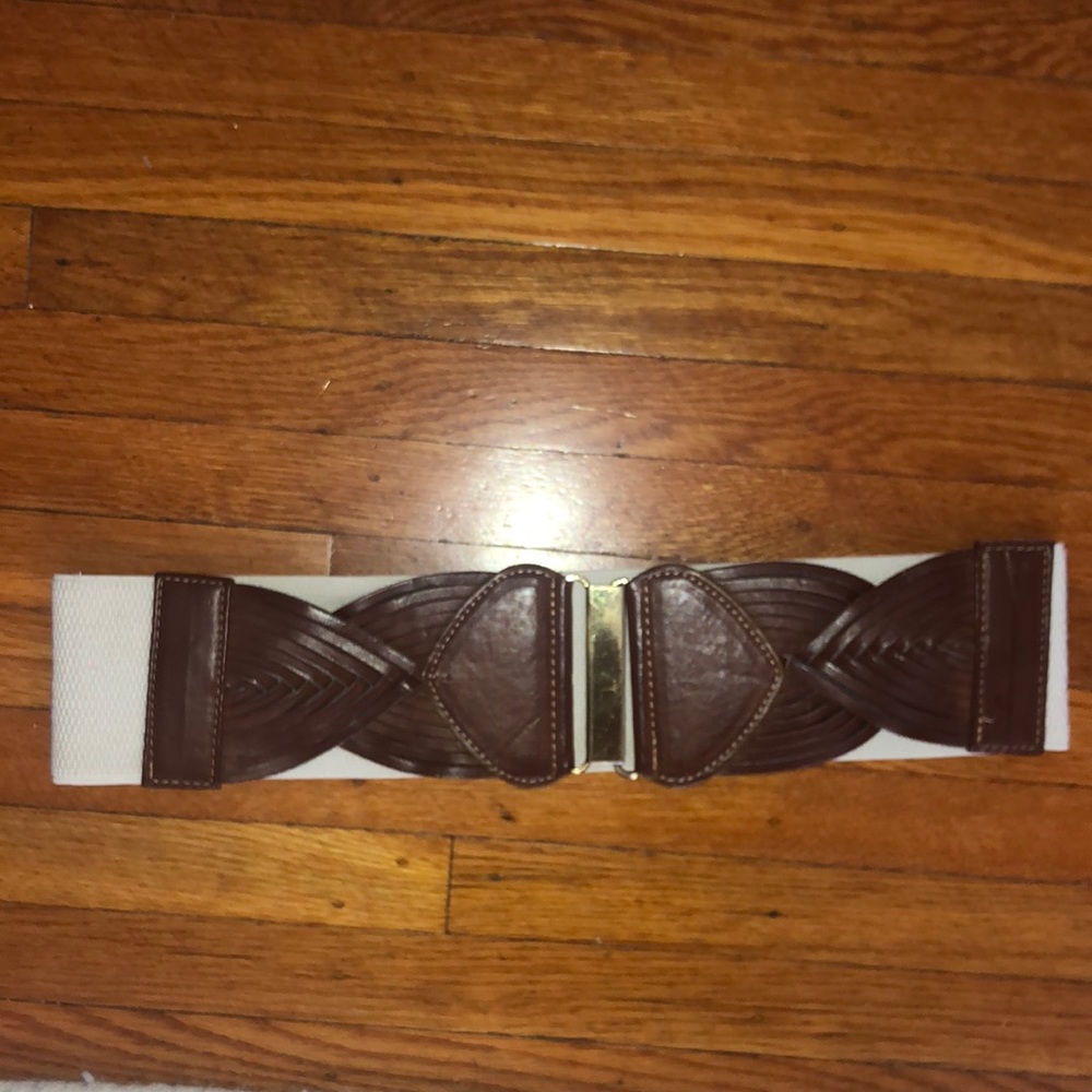 EUC belt with tan weaving pattern and gold buckle front closure